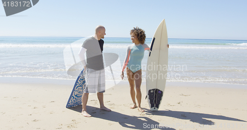 Image of People talking at the beach