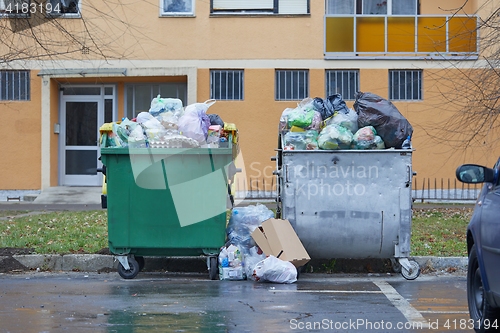 Image of Garbage Containers Full, Overflowing