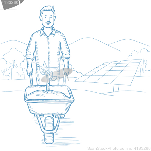 Image of Worker of solar power plant with sprout in cart.
