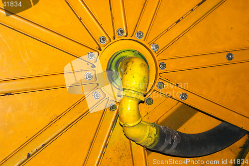 Image of Detail of a yellow excavator machine