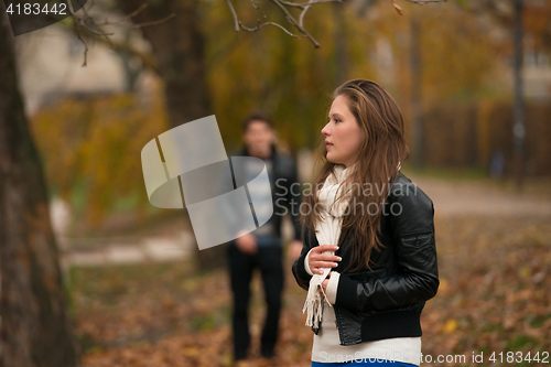 Image of Happy young Couple in Autumn Park