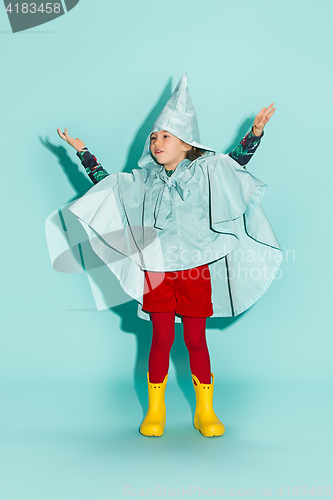 Image of Little girl posing in fashion style wearing autumn clothing.