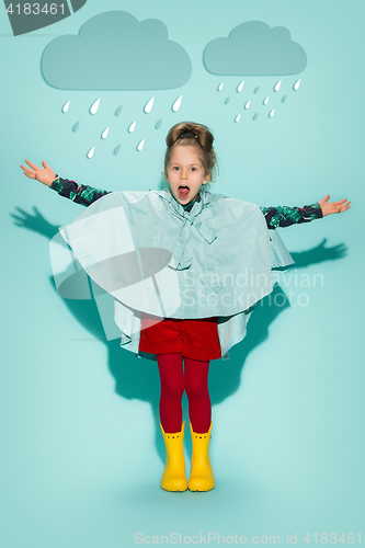 Image of Little girl posing in fashion style wearing autumn clothing.