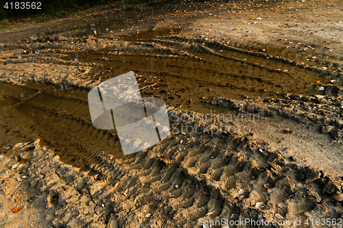 Image of Dirty broken rural road 