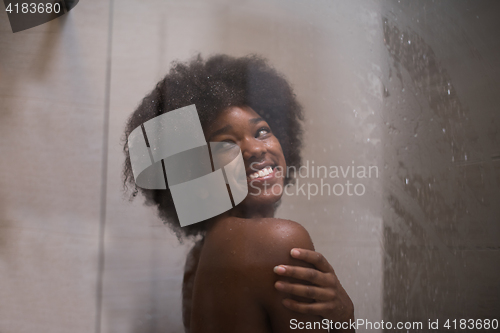 Image of African American woman in the shower