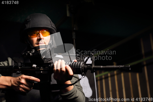 Image of The man with a gun. Military