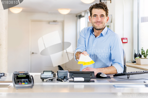 Image of Friendly Ticket sales clerk