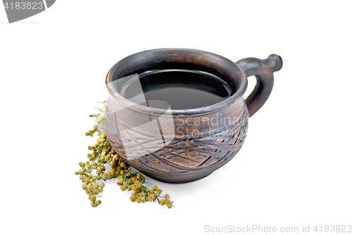 Image of Tea with wormwood in clay cup