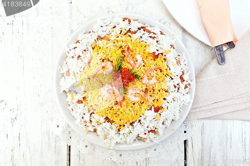 Image of Salad of salmon and seafood on board top