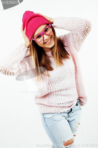 Image of young pretty teenage hipster girl posing emotional happy smiling on white background, lifestyle people concept 