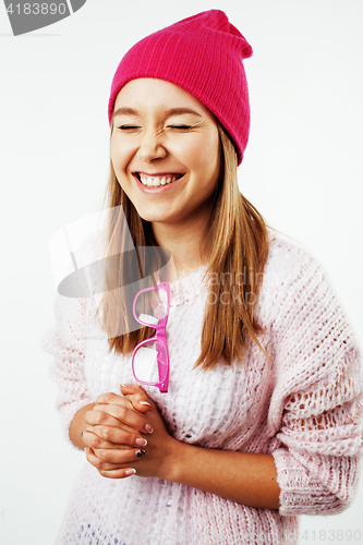 Image of young pretty teenage hipster girl posing emotional happy smiling on white background, lifestyle people concept 