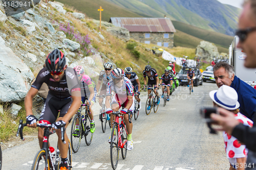 Image of The Peloton in Mountains - Tour de France 2015