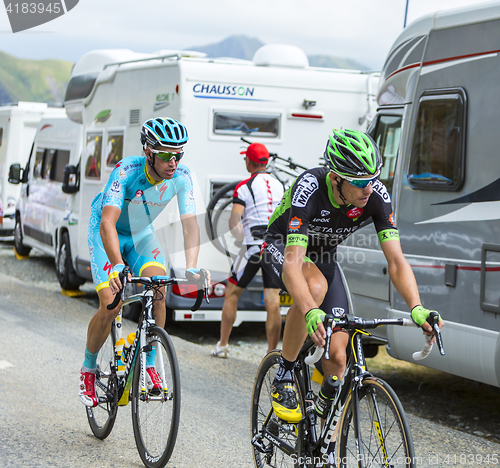 Image of Two Cyclists on the Mountains Roads -Tour de France 2015