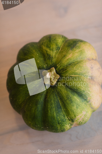 Image of pumpkin on a wooden table