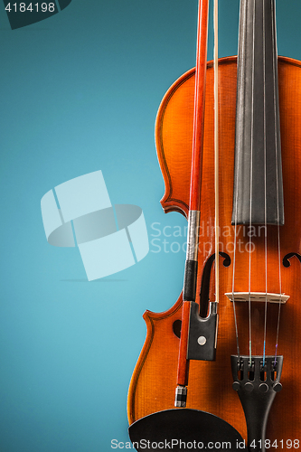 Image of The violin front view on blue