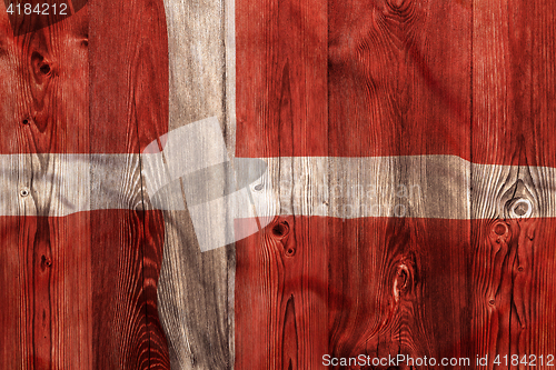 Image of National flag of Denmark, wooden background