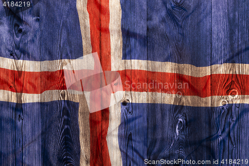 Image of National flag of Iceland, wooden background