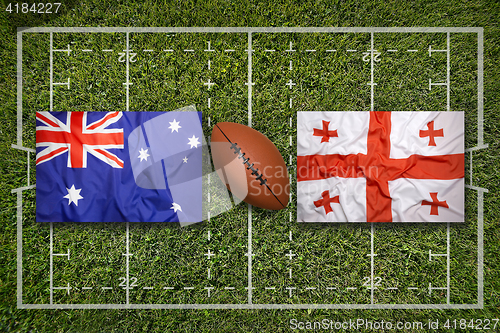 Image of Australia vs. Georgia\r flags on rugby field