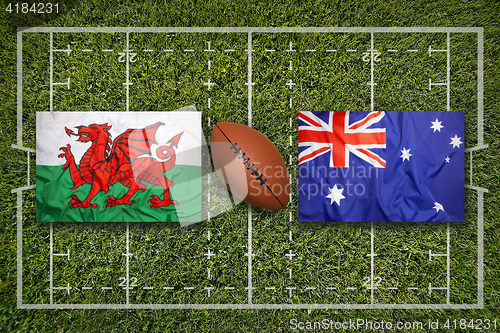 Image of Wales vs. Australia flags on rugby field