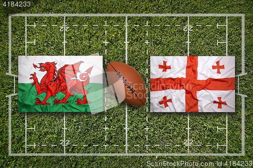 Image of Wales vs. Georgia flags on rugby field