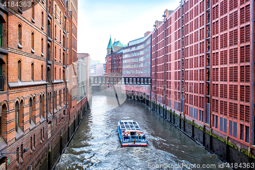 Image of Hamburg city canal and brick buildings