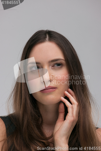 Image of portrait  of beautiful young brunette woman