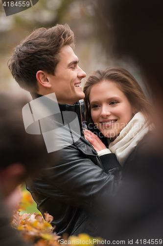 Image of Autumn portrait of attractive happy couple