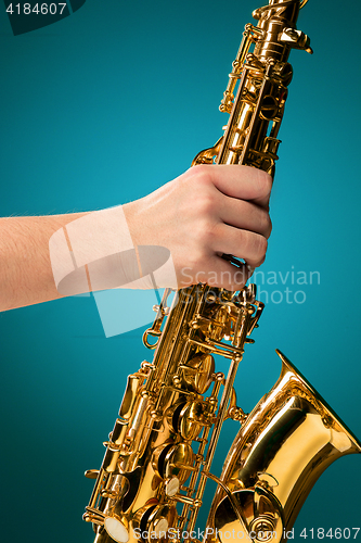 Image of Saxophone - Golden alto saxophone classical instrument