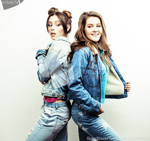 Image of best friends teenage girls together having fun, posing emotional on white background, besties happy smiling, lifestyle people concept 