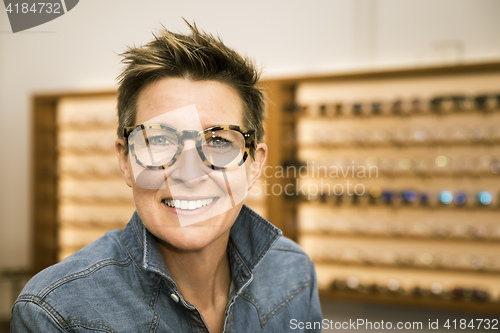 Image of woman in a eyewear store