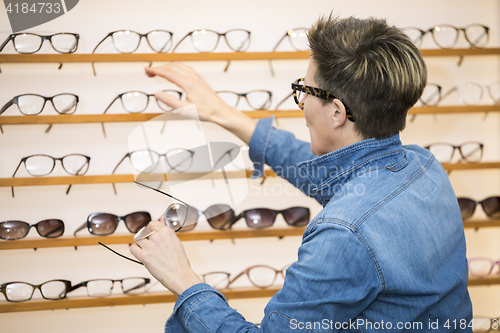 Image of woman in a eyewear store