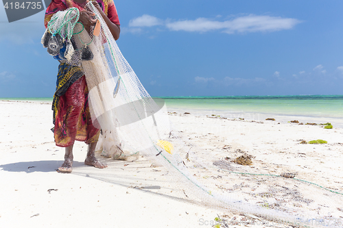 Image of Traditional african local rural fishing on Paje beach, Zanzibar, Tanzania.