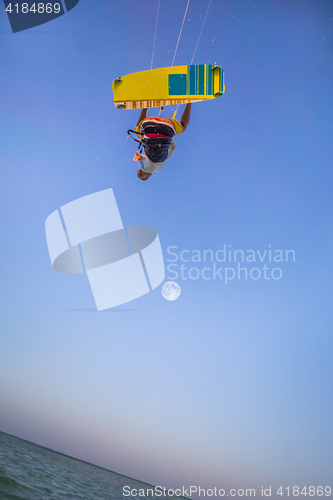 Image of Kiteboarding. Fun in ocean. Extreme Sport Kitesurfing.