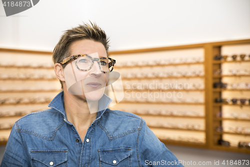 Image of woman in a eyewear store