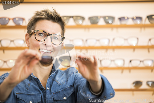 Image of woman in a eyewear store