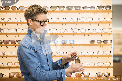 Image of woman in a eyewear store