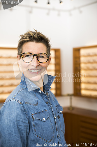 Image of woman in a eyewear store