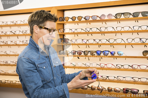 Image of woman in a eyewear store