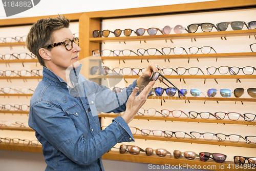 Image of woman in a eyewear store