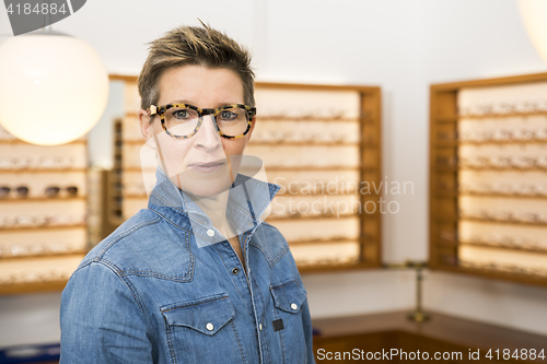 Image of woman in a eyewear store