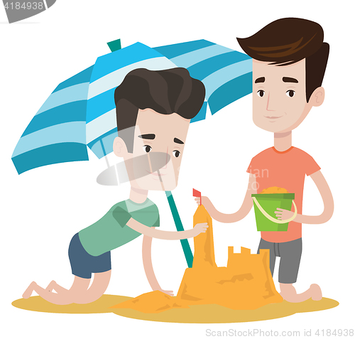 Image of Male friends building sandcastle.