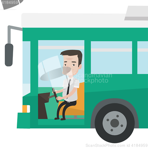 Image of Caucasian bus driver sitting at steering wheel.