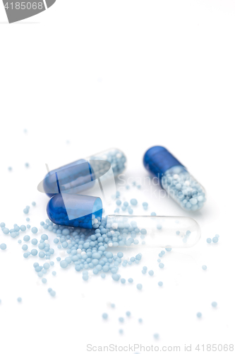 Image of Blue capsules and pills background