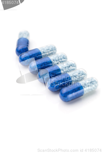 Image of Blue capsules and pills background