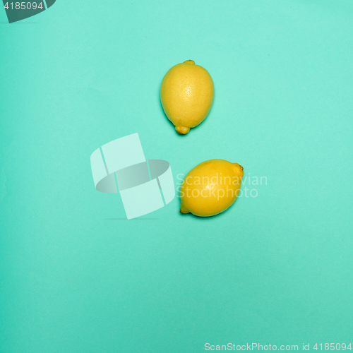 Image of Lemons on blue background