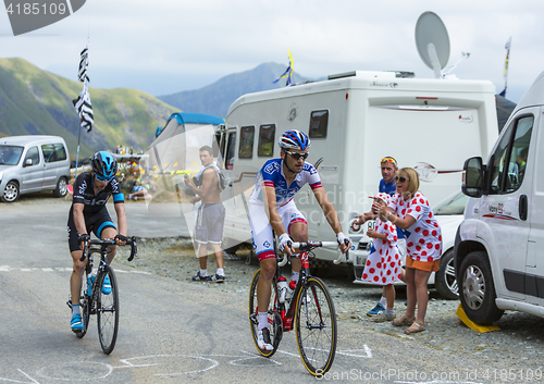 Image of Two Cyclists on the Mountains Roads -Tour de France 2015