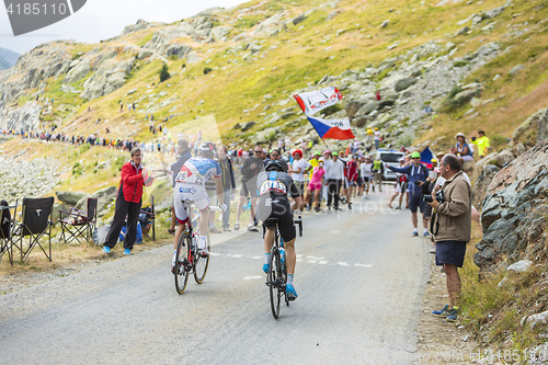 Image of Two Cyclists on the Mountains Roads -Tour de France 2015