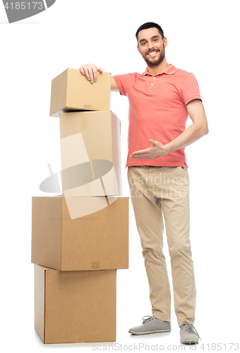 Image of happy man with cardboard boxes