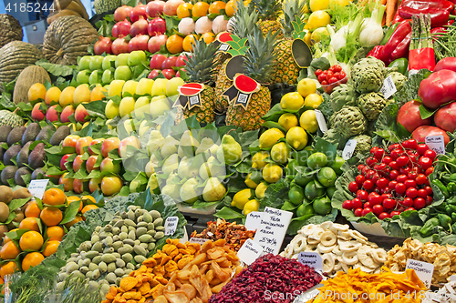 Image of Many various fruit and vegetables at a market stall in Barcelona