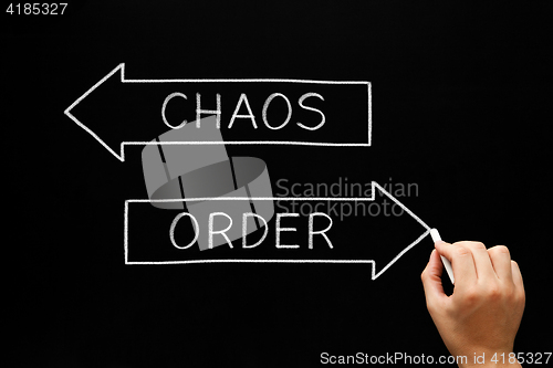 Image of Order Chaos Arrows Concept On Blackboard